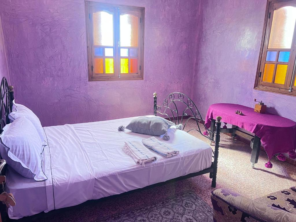 Postel nebo postele na pokoji v ubytování Maison Face au lion