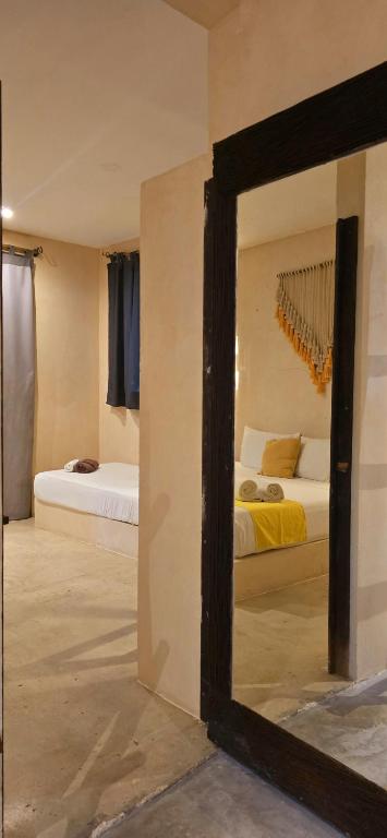 Postel nebo postele na pokoji v ubytování Hotel Kin Tulum Jungle Deluxe