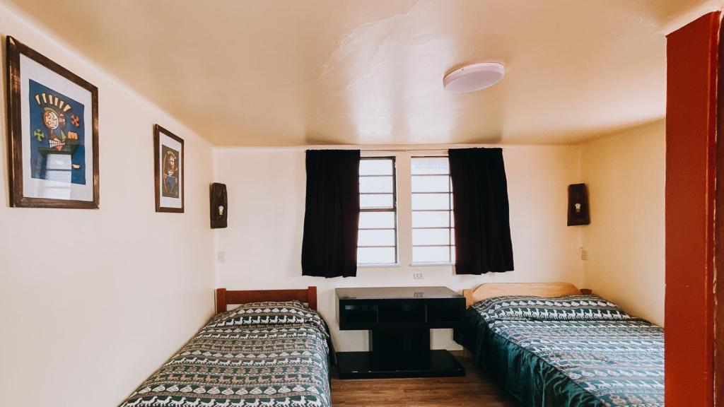 Voodi või voodid majutusasutuse Royal Frankenstein Hostel toas