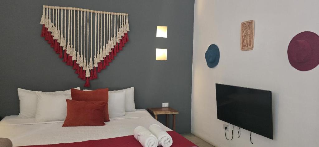 TV a/nebo společenská místnost v ubytování Hotel Kin Tulum Jungle Deluxe