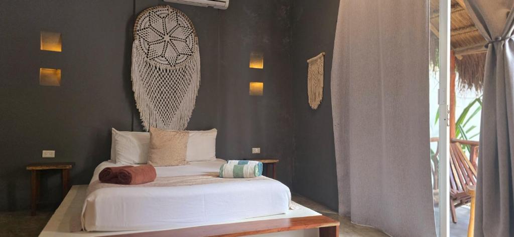 Postel nebo postele na pokoji v ubytování Hotel Kin Tulum Jungle Deluxe