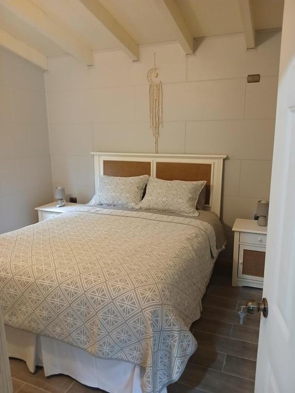 Ένα ή περισσότερα κρεβάτια σε δωμάτιο στο Del bosque 5