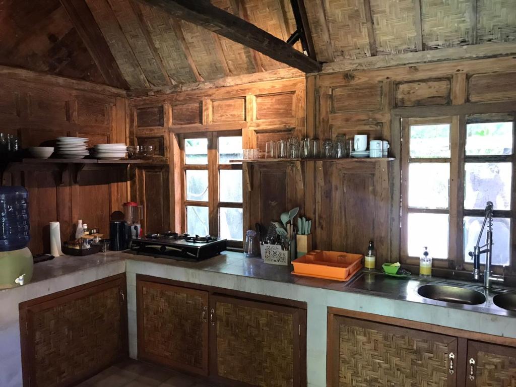 Kuchyň nebo kuchyňský kout v ubytování Mari Posa Cottage #2