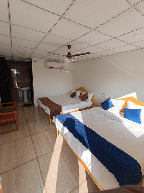 Postel nebo postele na pokoji v ubytování Cresta Villa Resort