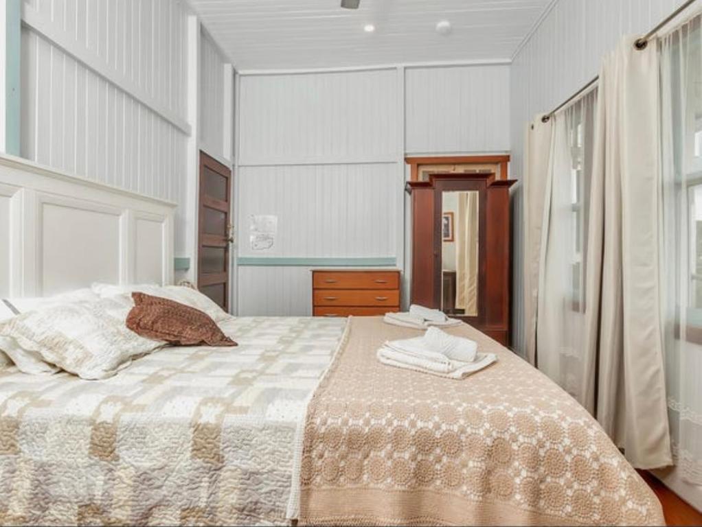 Ένα ή περισσότερα κρεβάτια σε δωμάτιο στο The Falls Teahouse