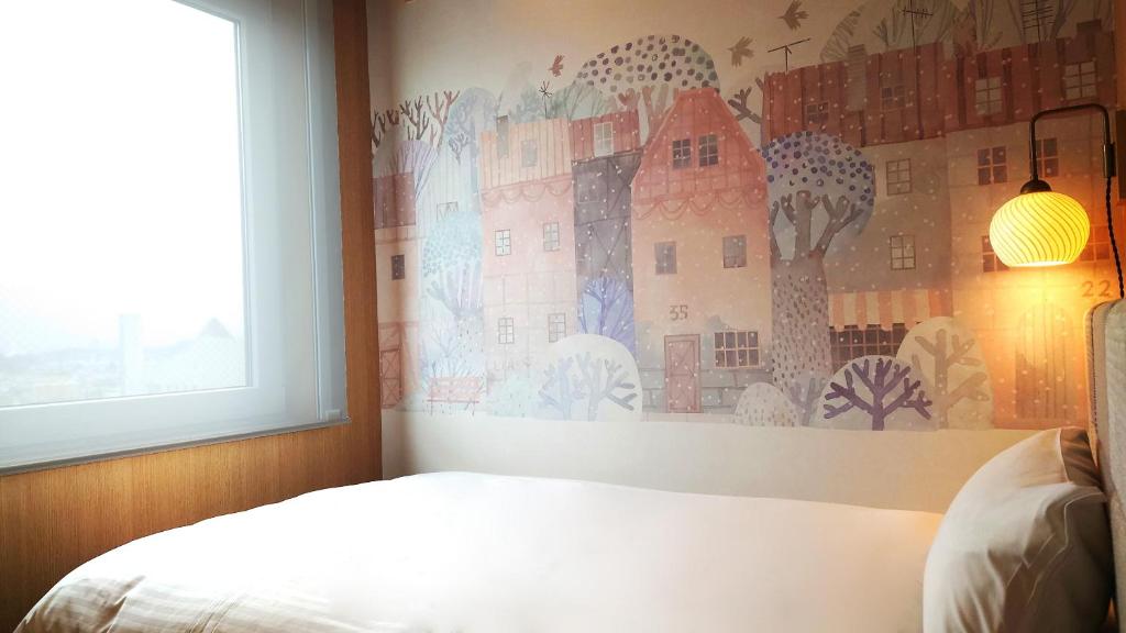 Postel nebo postele na pokoji v ubytování Hotel Nostal Yokote