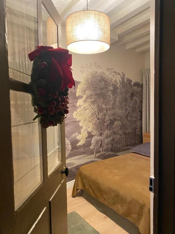 Postel nebo postele na pokoji v ubytování Les Hortensias
