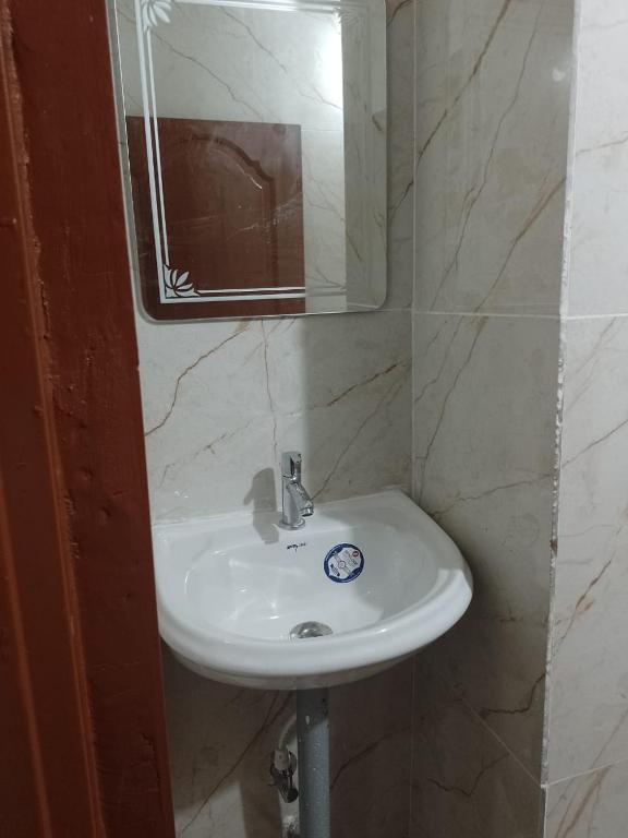 Koupelna v ubytování UDUPI YATHRINiVAS