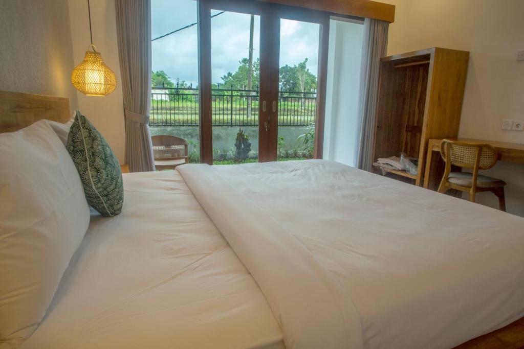 Postel nebo postele na pokoji v ubytování ANYA Guest House