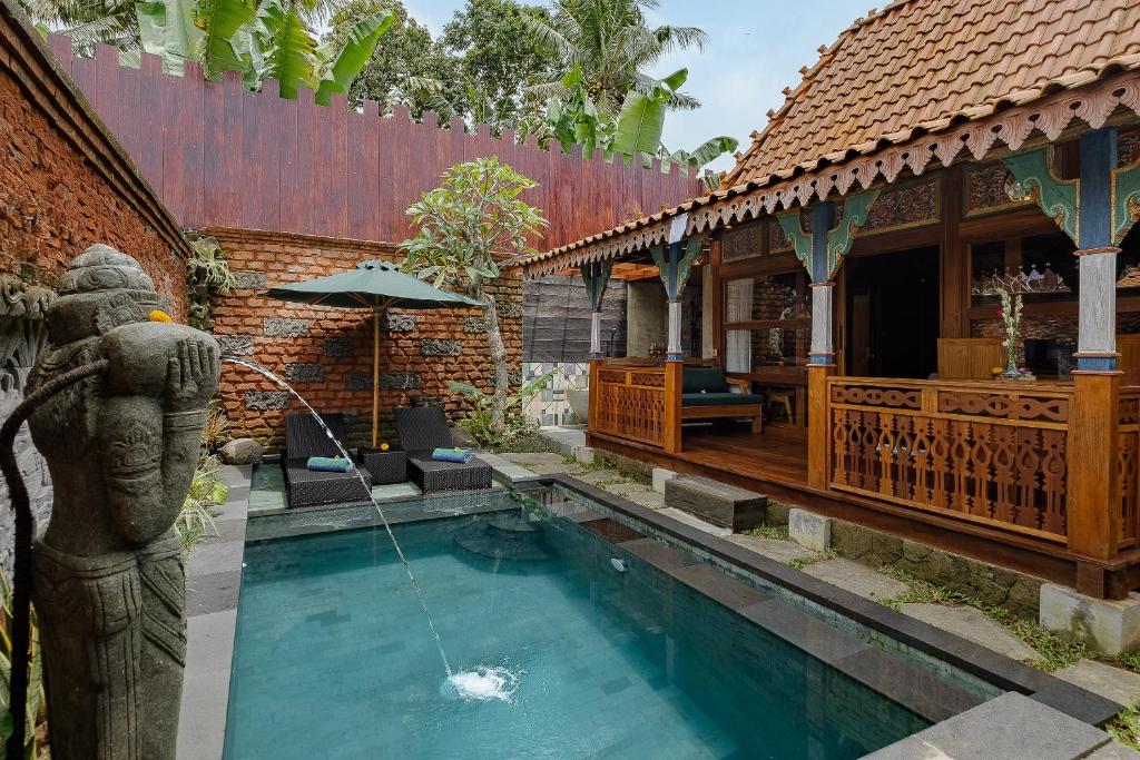 Πισίνα στο ή κοντά στο Kappat Ubud Villa