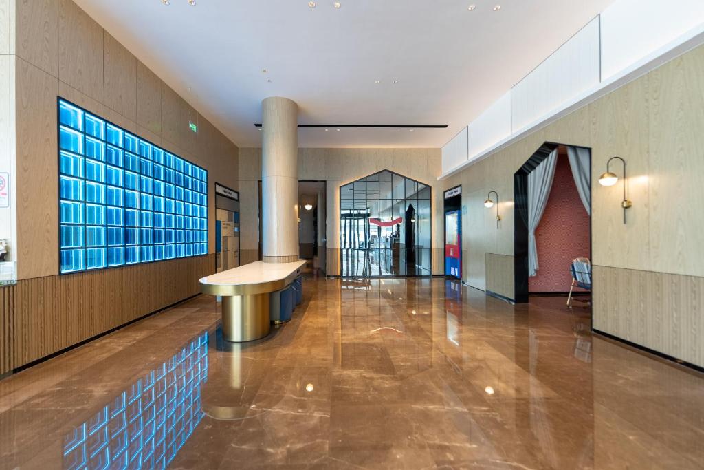 Fotografie z fotogalerie ubytování Echarm International Hotel Guangzhou Baiyun International Airport Qingbu Metro Branch - Free Deliver Service to Guangzhou Baiyun International Airport & Free Deliver Service to Canton Fair Complex During Canton Fair Period v Kantonu