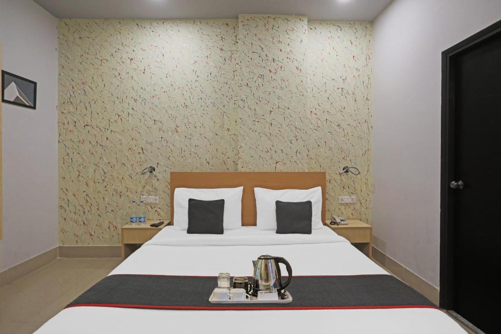 Postel nebo postele na pokoji v ubytování Super Townhouse Grand Pacific Ocean