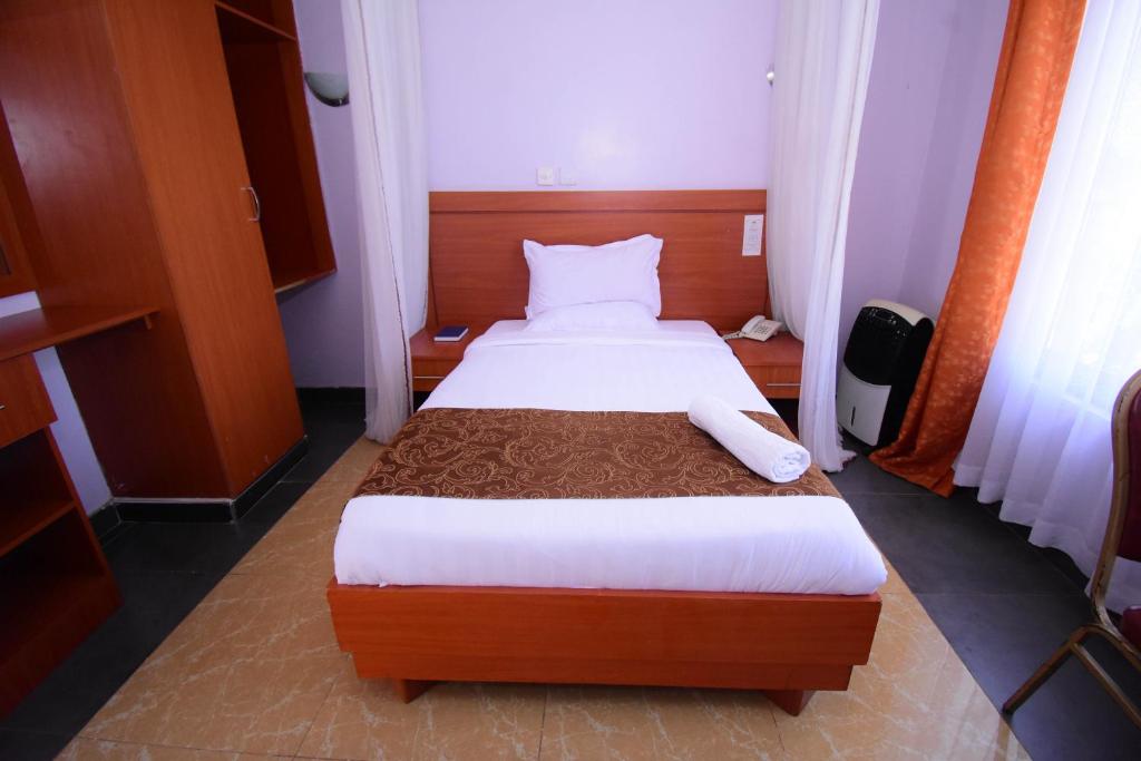 Postel nebo postele na pokoji v ubytování Sunstar Hotel Nairobi