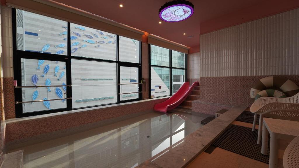 Posezení v ubytování Almond Kids Poolvilla Nampo