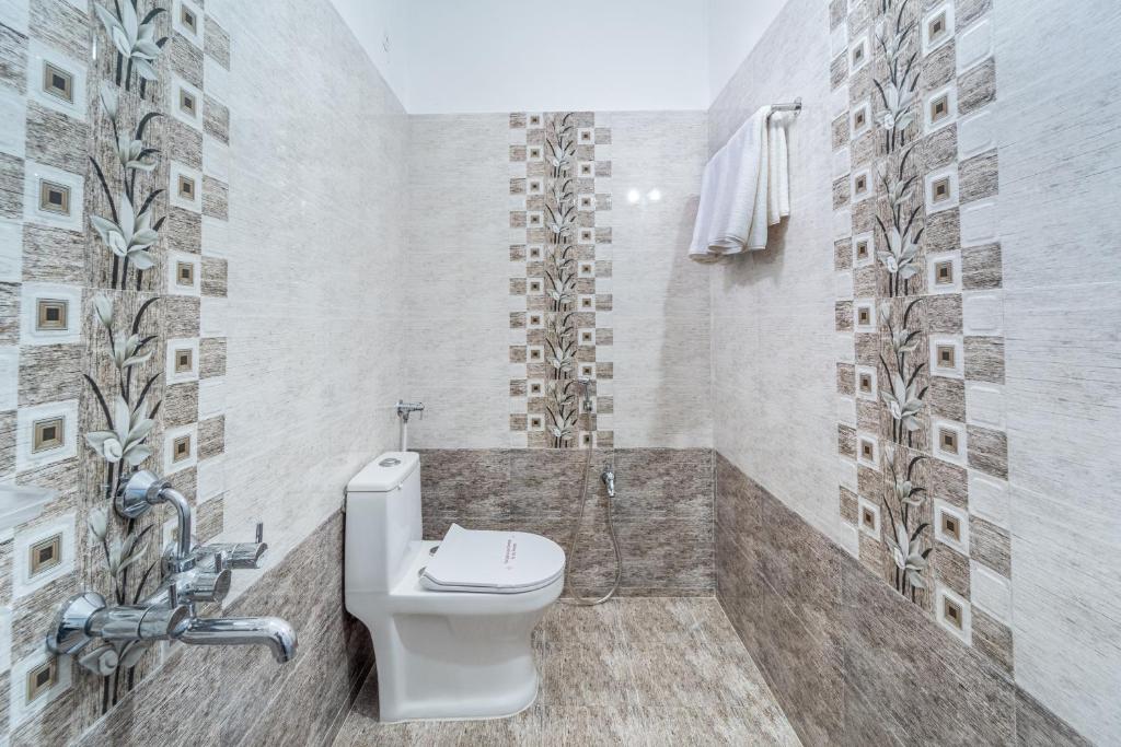 Koupelna v ubytování Sam Residency