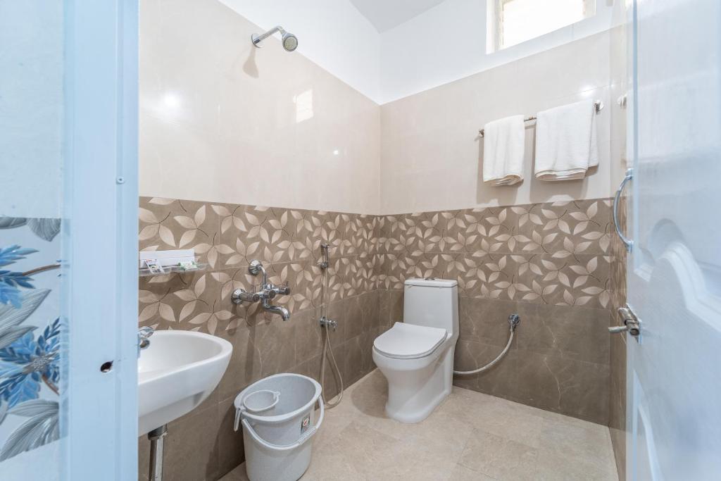 Koupelna v ubytování Sam Residency