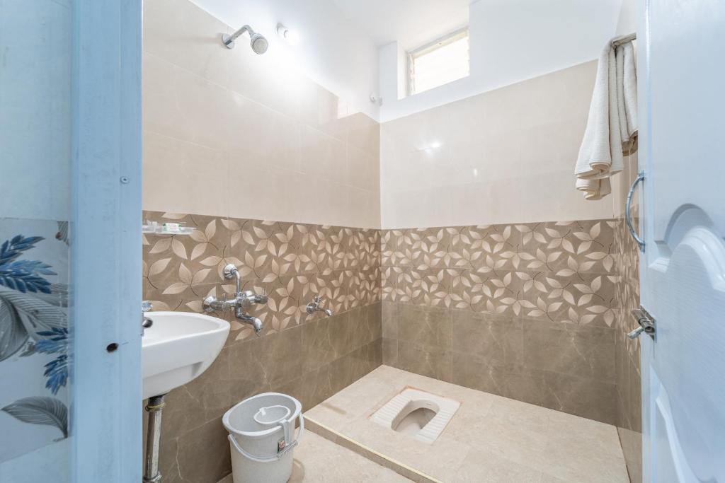 Koupelna v ubytování Sam Residency