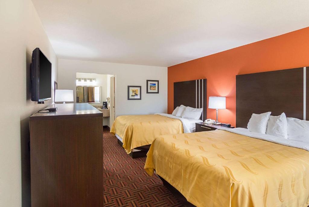 Postel nebo postele na pokoji v ubytování Quality Inn Amarillo I-40 East