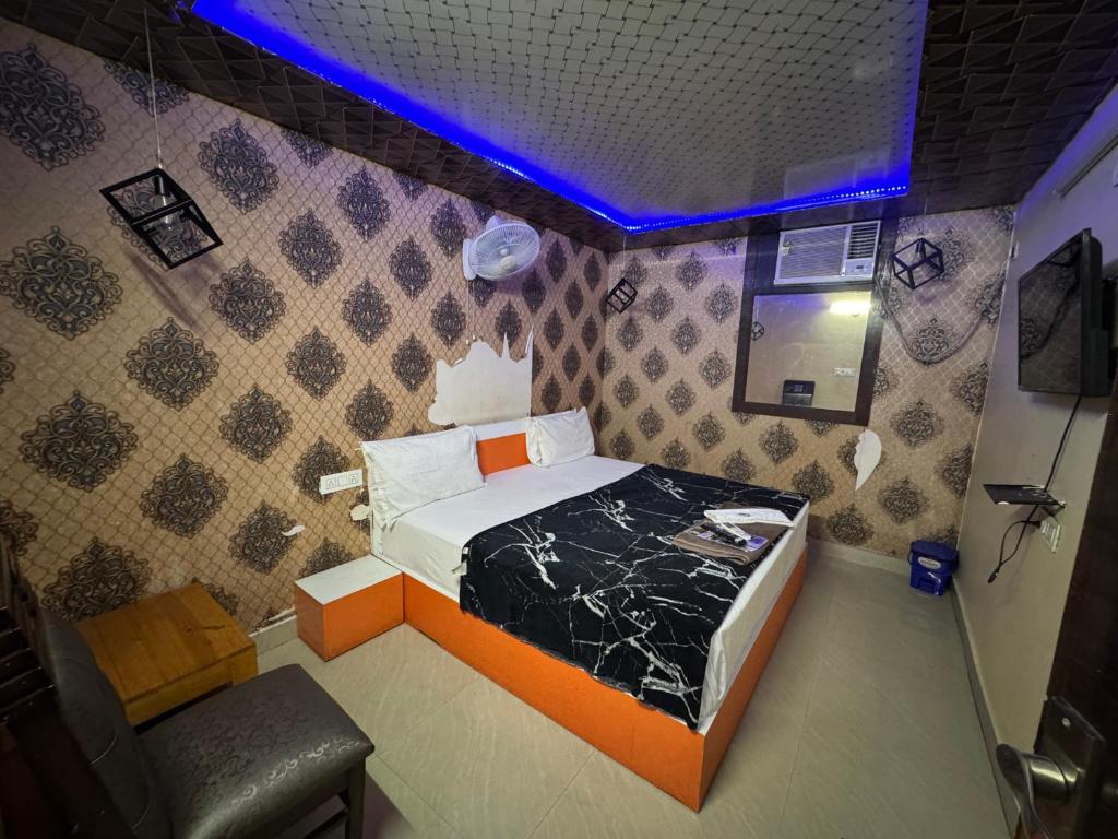 Postel nebo postele na pokoji v ubytování Hotel RedBee