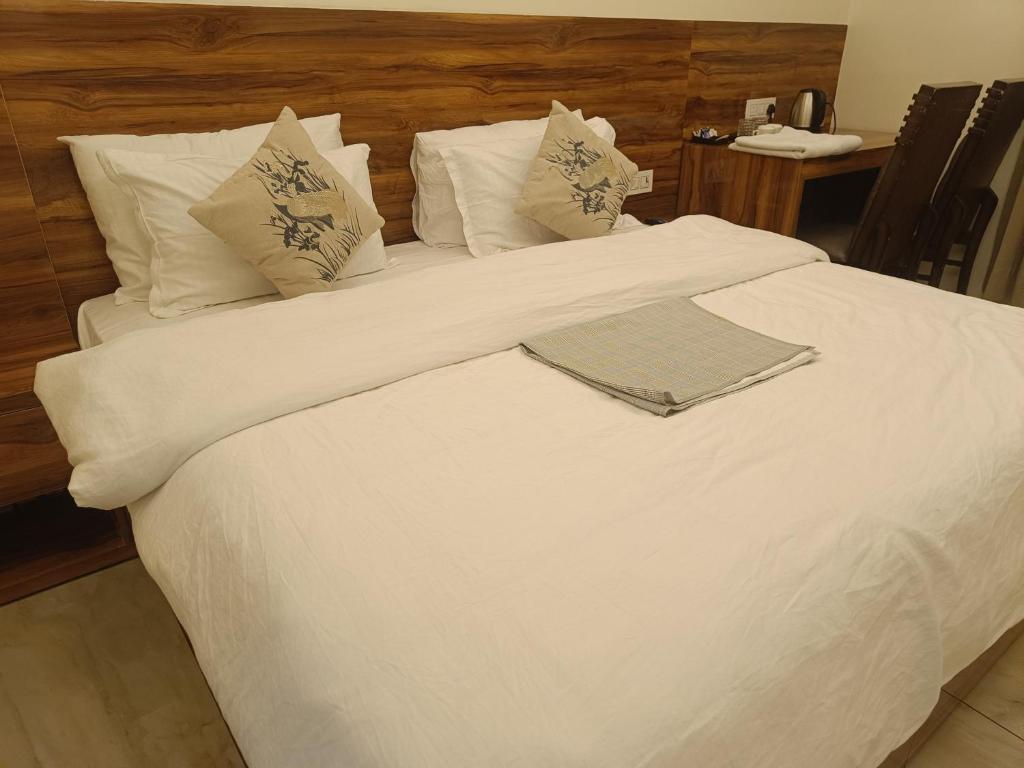 Postel nebo postele na pokoji v ubytování Hotel RedBee