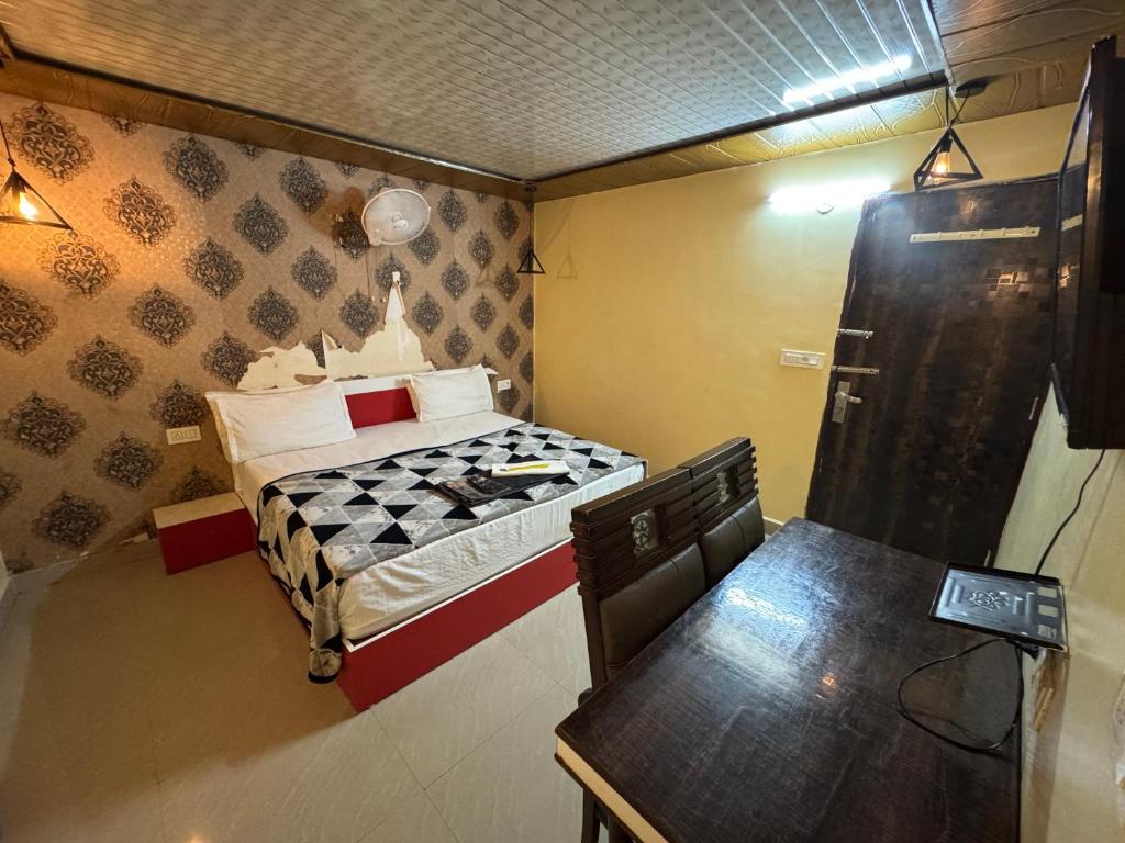 Postel nebo postele na pokoji v ubytování Hotel RedBee