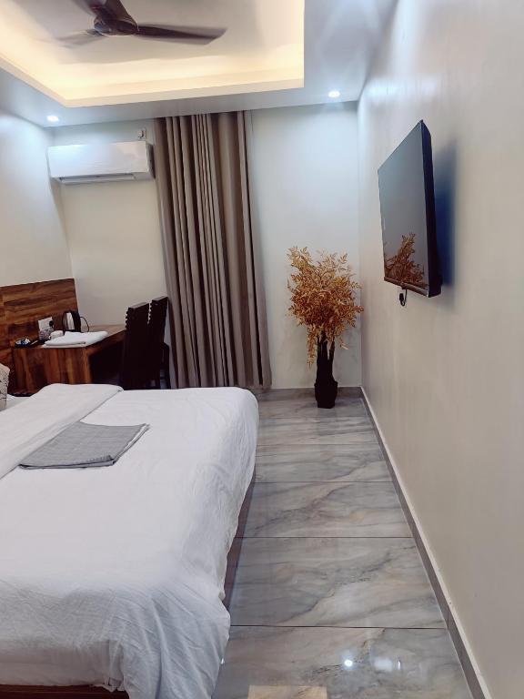 TV a/nebo společenská místnost v ubytování Hotel RedBee