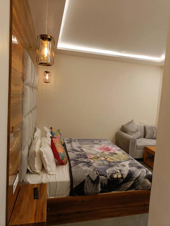 Postel nebo postele na pokoji v ubytování Hotel RedBee
