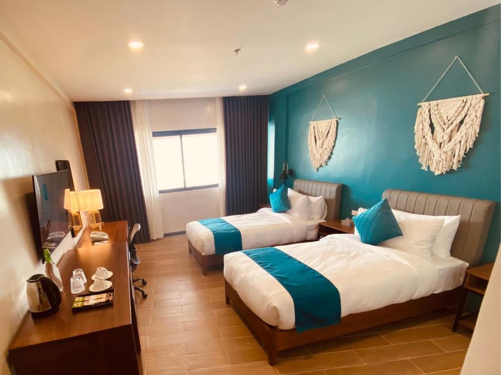 Postel nebo postele na pokoji v ubytování Hudor Resort - Bauang, La Union