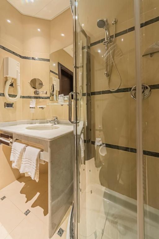 Koupelna v ubytování Dado Hotel International