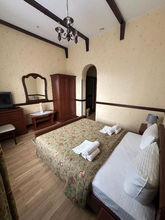 Postel nebo postele na pokoji v ubytování Hotel&Restaurant SENATOR