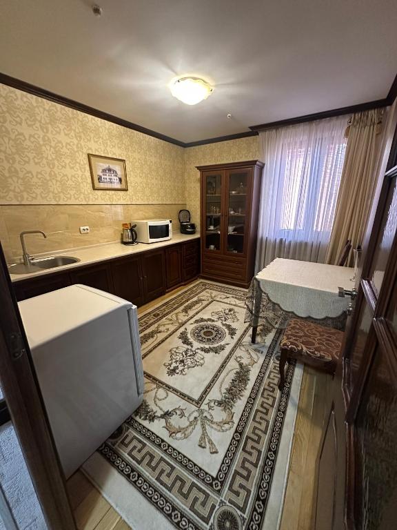 Kuchyň nebo kuchyňský kout v ubytování Hotel&Restaurant SENATOR