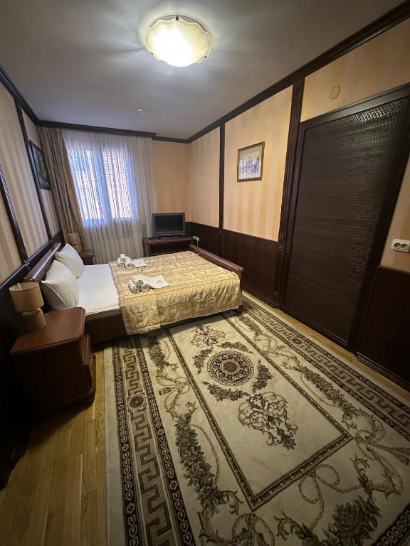 Postel nebo postele na pokoji v ubytování Hotel&Restaurant SENATOR