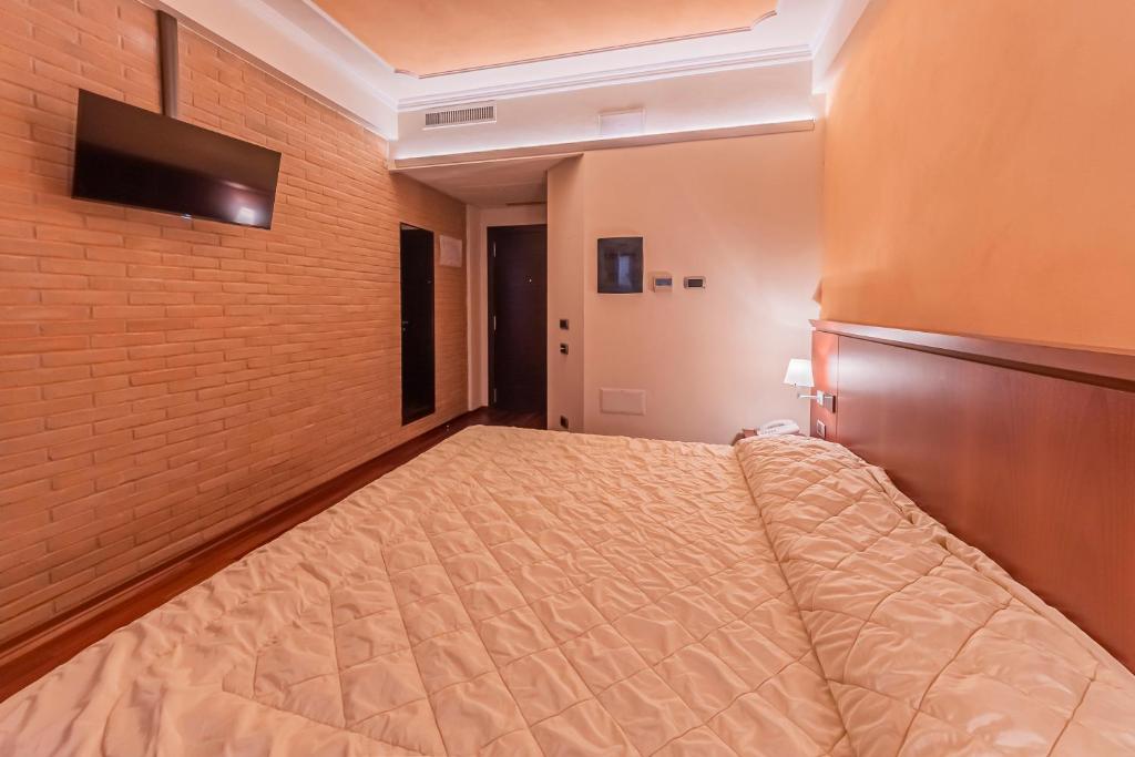 Postel nebo postele na pokoji v ubytování Dado Hotel International