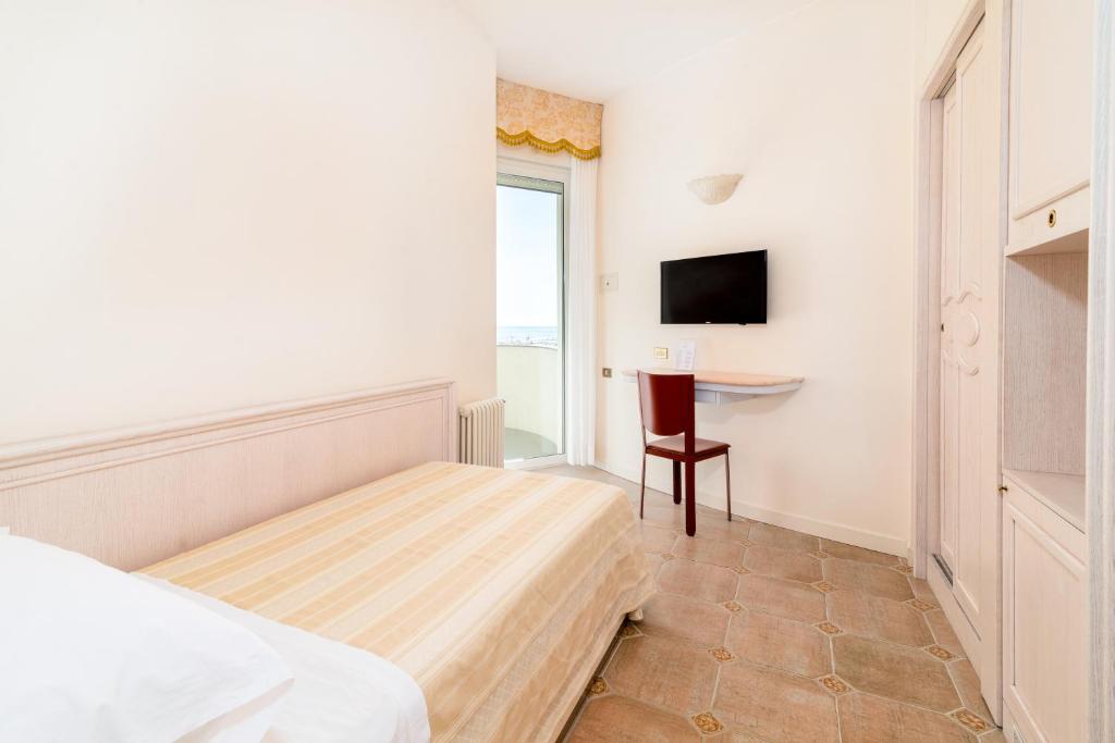 TV a/nebo společenská místnost v ubytování Universal Hotel