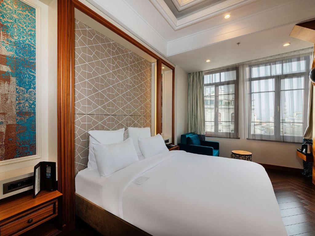 Cama ou camas em um quarto em Mercure Istanbul Sirkeci