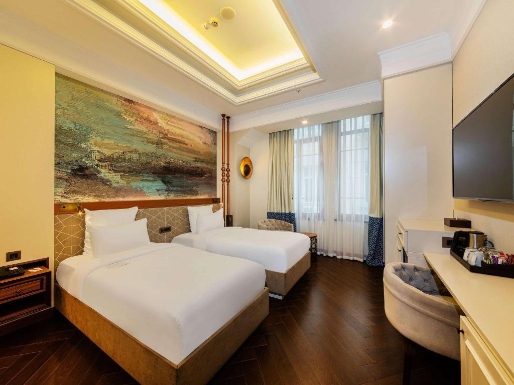 Cama ou camas em um quarto em Mercure Istanbul Sirkeci