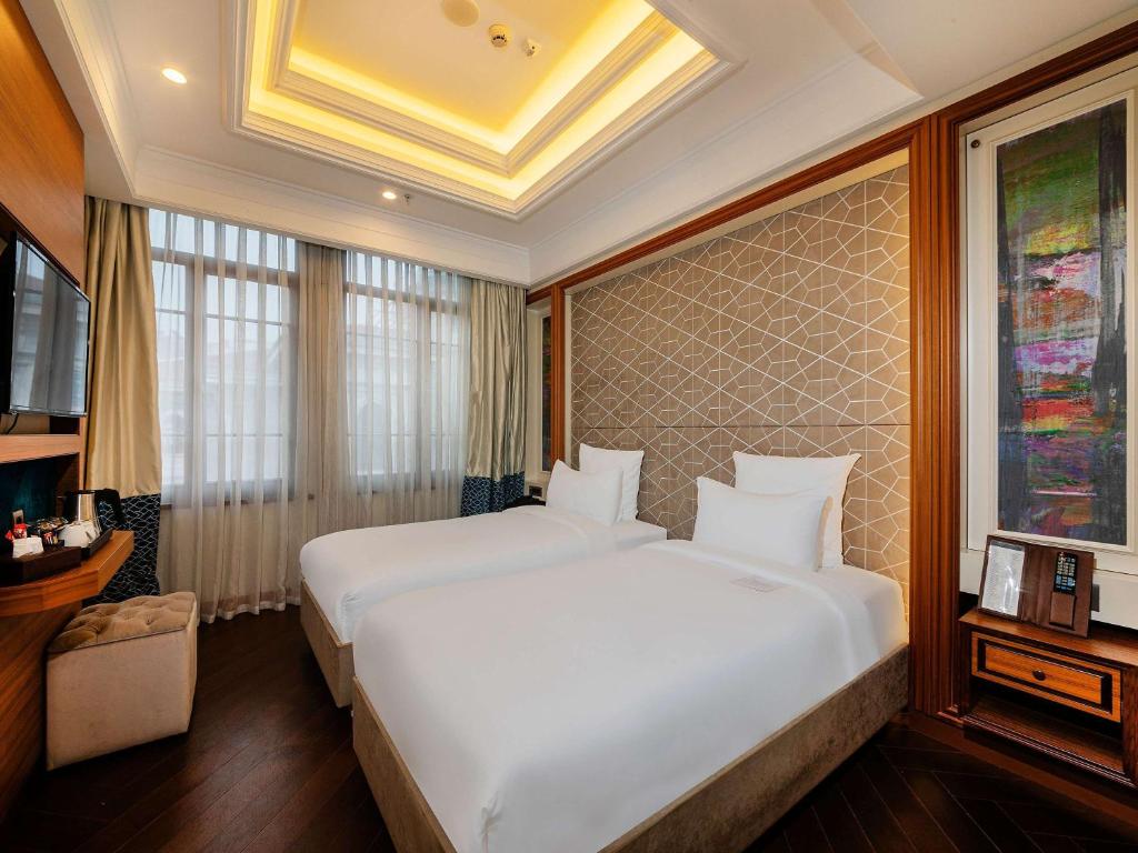 Cama ou camas em um quarto em Mercure Istanbul Sirkeci
