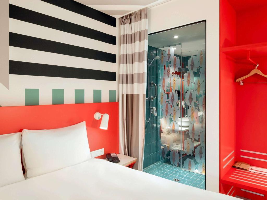 Postel nebo postele na pokoji v ubytování ibis Styles Warszawa Centrum