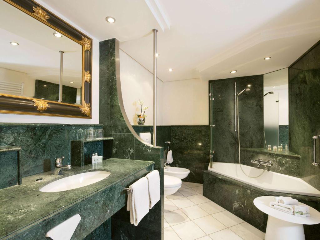 Koupelna v ubytování Mövenpick Hotel Münster am Aasee