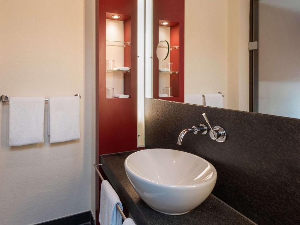 Koupelna v ubytování Mövenpick Hotel Münster am Aasee