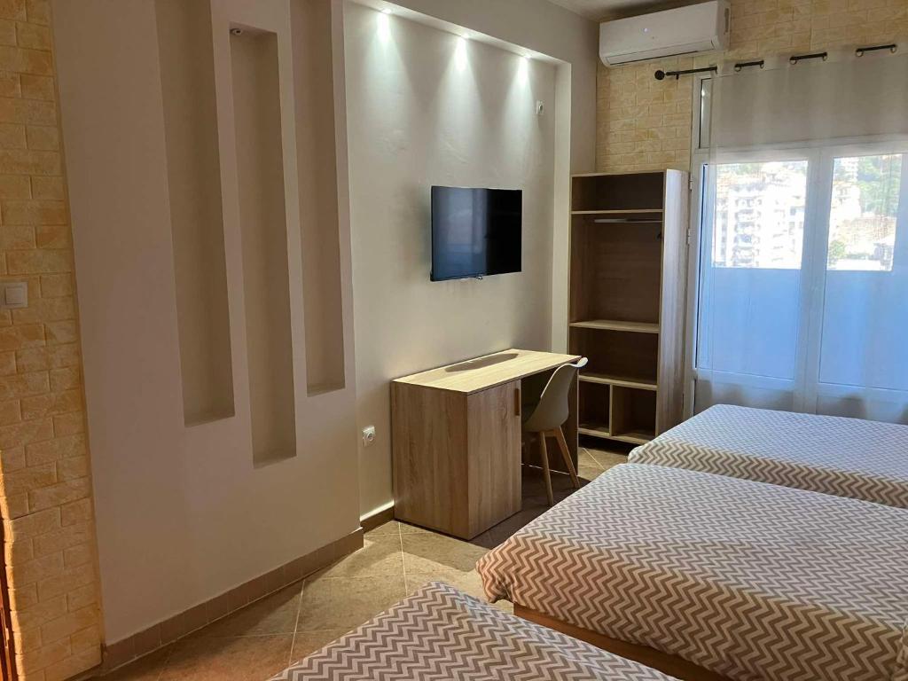 Postel nebo postele na pokoji v ubytování Hôtel Mon Royaume