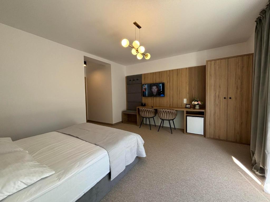Posteľ alebo postele v izbe v ubytovaní Resort EDEN domki, apartamenty i pokoje