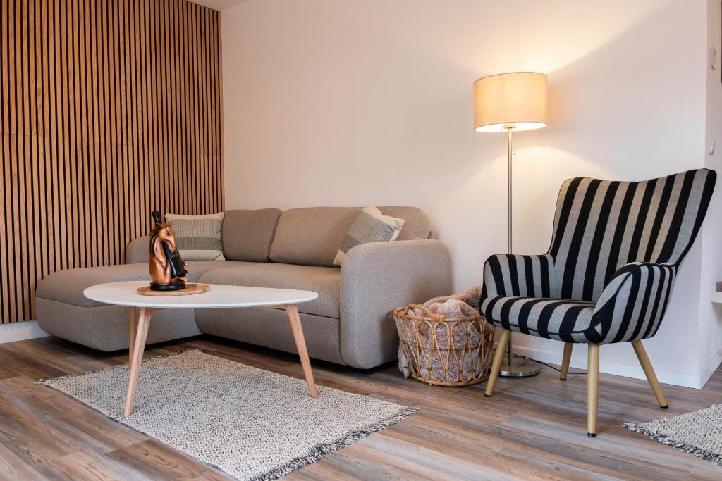 Posezení v ubytování Ferienwohnungen Reiterhof Boltenhagen