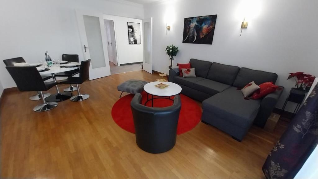 Et opholdsområde på Appart 80m2 tout équipé Châteaucreux Zénith Stade