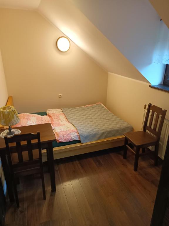 Postel nebo postele na pokoji v ubytování Pensjonat Wiking