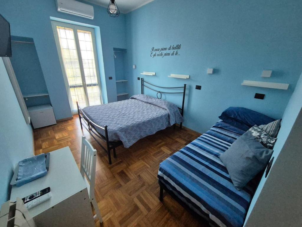 Postel nebo postele na pokoji v ubytování La Bertina