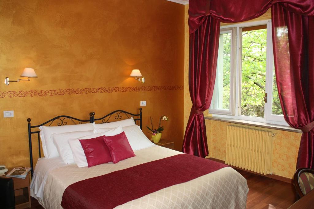 Postel nebo postele na pokoji v ubytování Park Hotel
