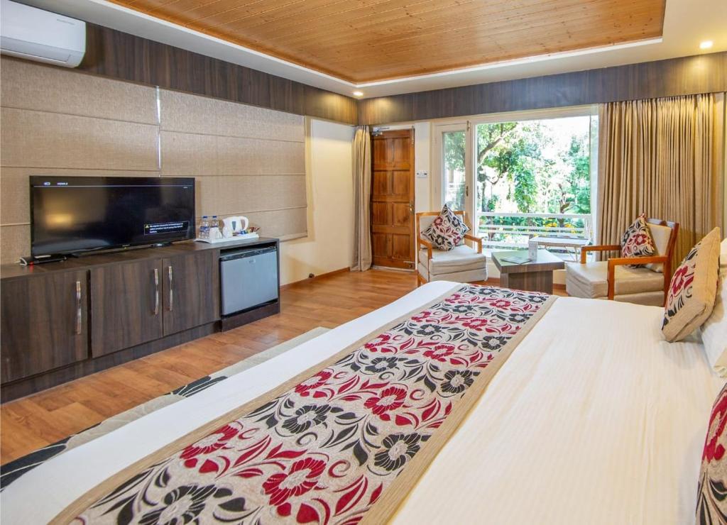 TV a/nebo společenská místnost v ubytování The Orchard Retreat & Spa