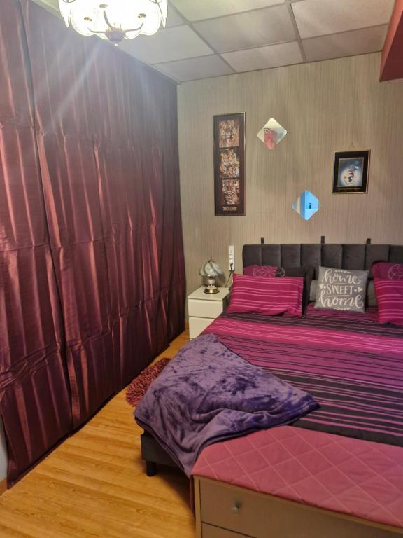 Postel nebo postele na pokoji v ubytování Chambres de Fabienne