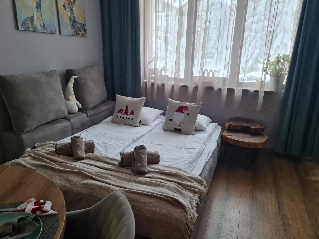 Posezení v ubytování Mountain Peak Apartment